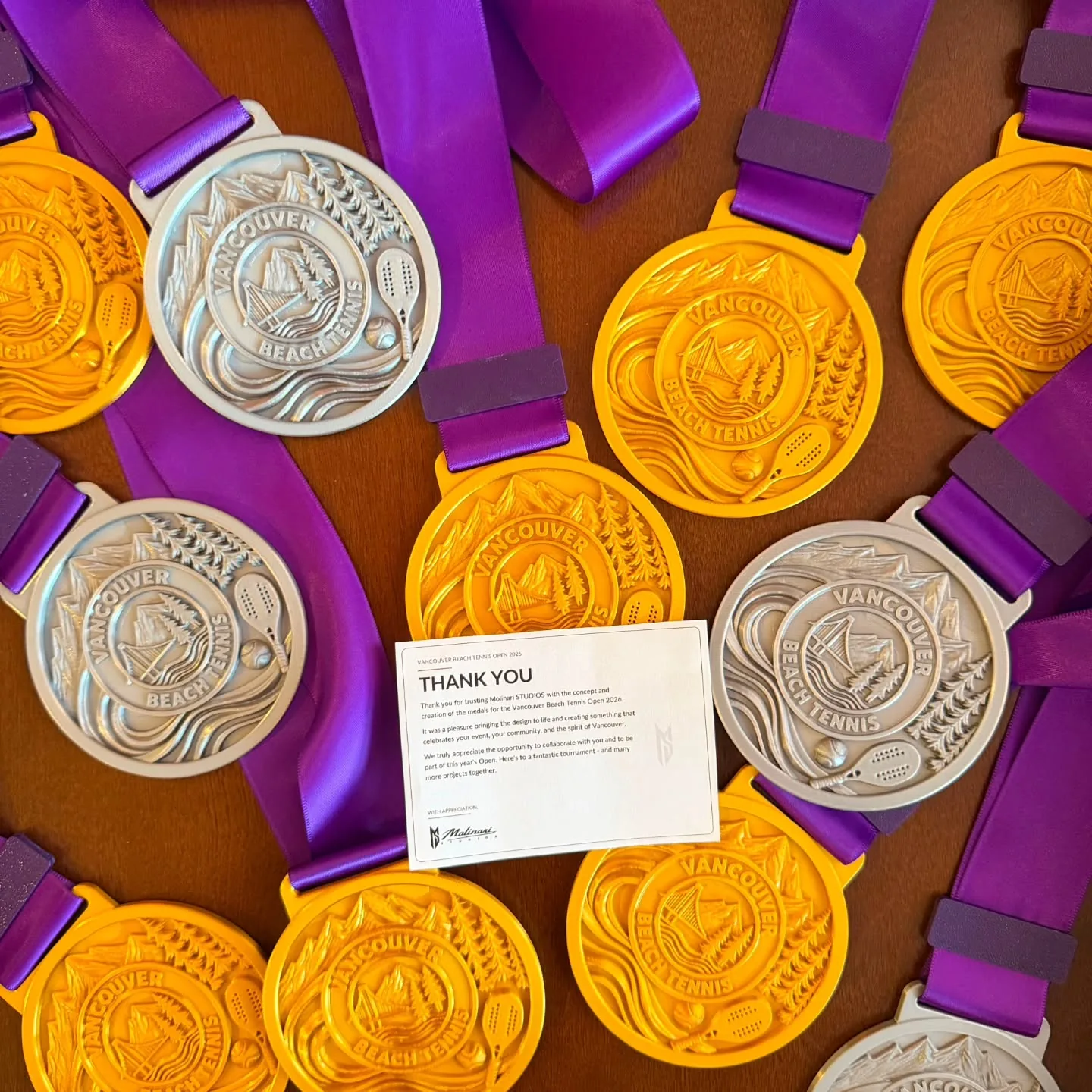 Custom first- and second-place medals made for the Vancouver Beach Tennis Open